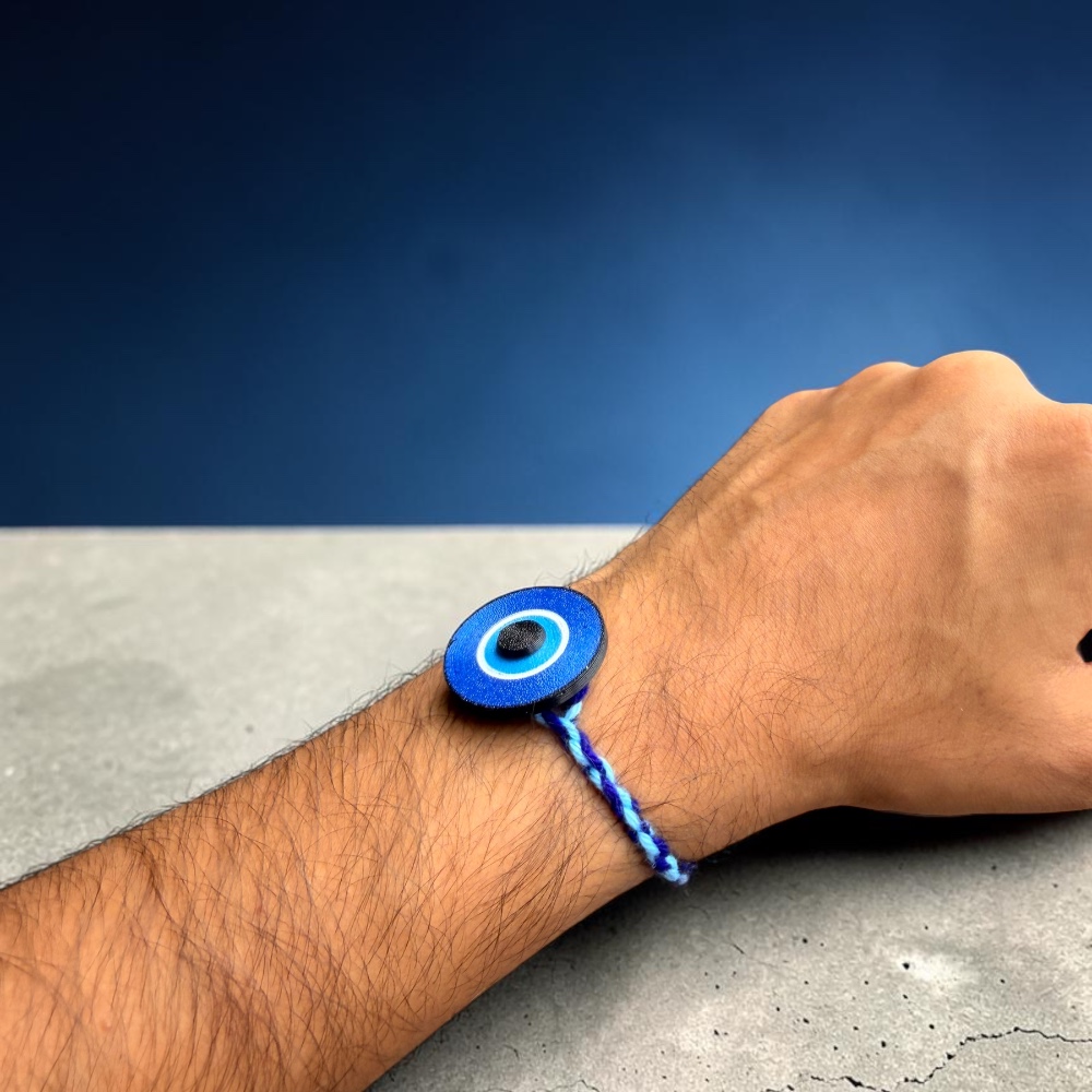 Evil eye spinner rakhi